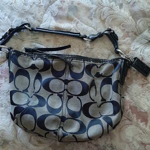 Coach purse with coach keychain